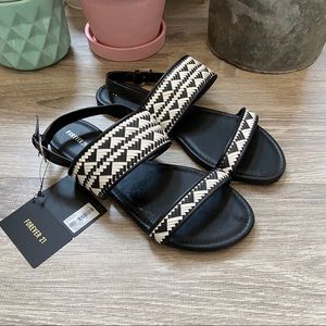 Black and white sandals